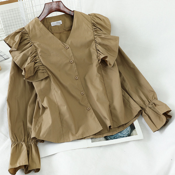 Új modell női ing fürtökkel és V-nyakkal