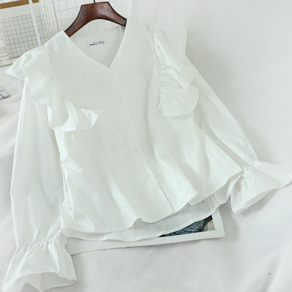 Új modell női ing fürtökkel és V-nyakkal