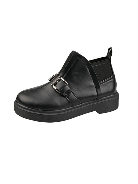 Műbőrből készült alkalmi női csizma lapos talppal, fém csatokkal