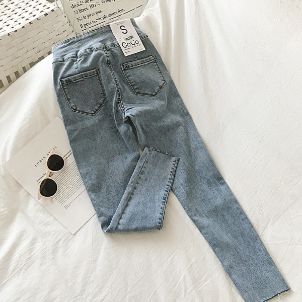 Modern női farmer magas derékkal és zsebekkel Karcsú modell