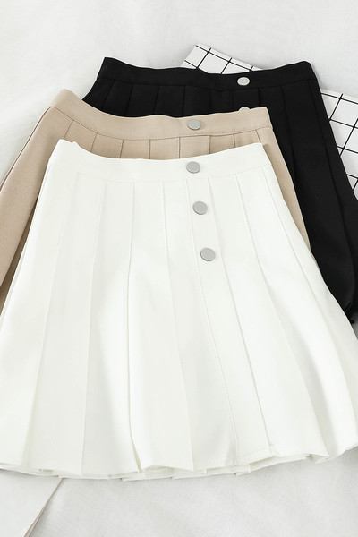 Hajtogatott női szoknya magas derékkal, gombokkal
