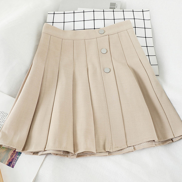 Hajtogatott női szoknya magas derékkal, gombokkal