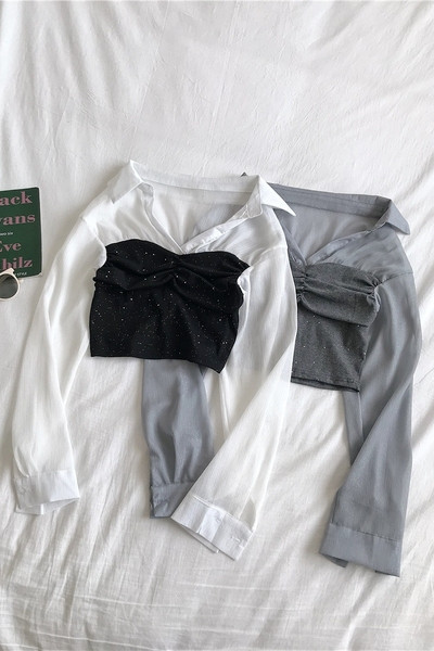 Modern női rövid ing klasszikus gallérral és fényes részecskékkel