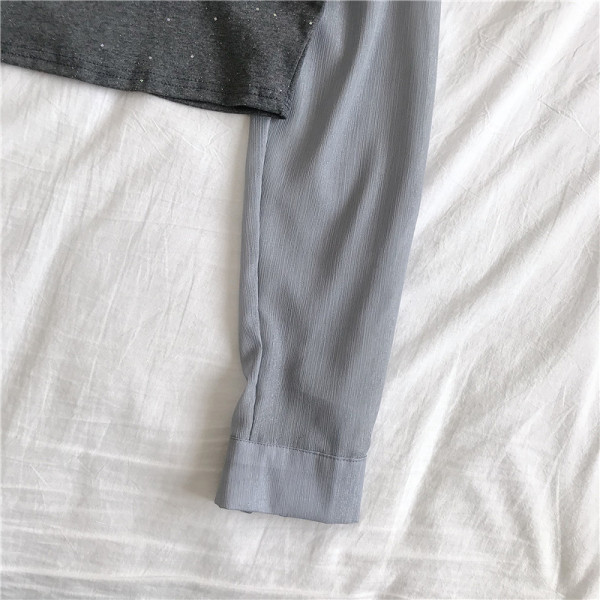 Modern női rövid ing klasszikus gallérral és fényes részecskékkel