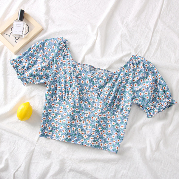 Modern női blúz rövid ujjal és csónakos nyakkivágással