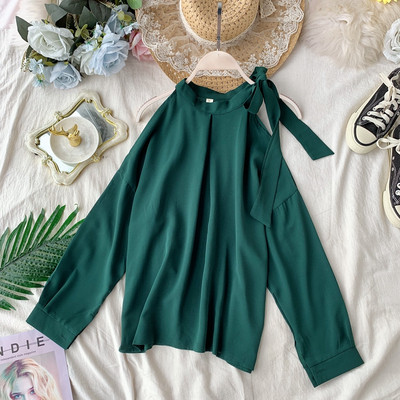 Moodne naiste särk pitside ja pikkade varrukatega