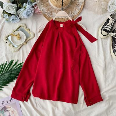 Moodne naiste särk pitside ja pikkade varrukatega