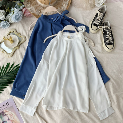 Moodne naiste särk pitside ja pikkade varrukatega