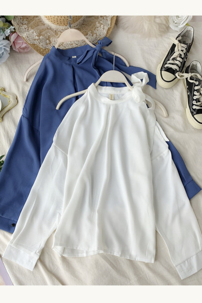 Moodne naiste särk pitside ja pikkade varrukatega