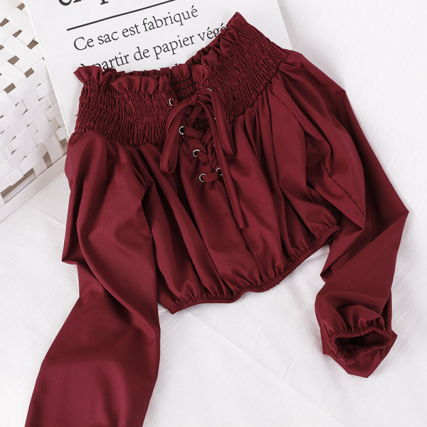 Σύντομη γυναικεία μπλούζα με μακριά μανίκια και κορδόνια