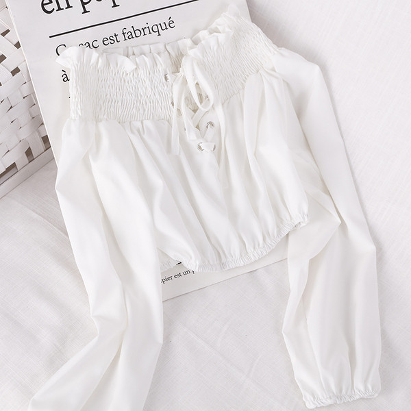 Σύντομη γυναικεία μπλούζα με μακριά μανίκια και κορδόνια