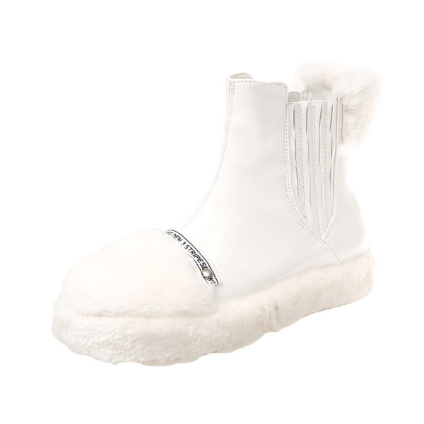 Modern, fényes női csizma pehelyszínnel, fekete-fehérben