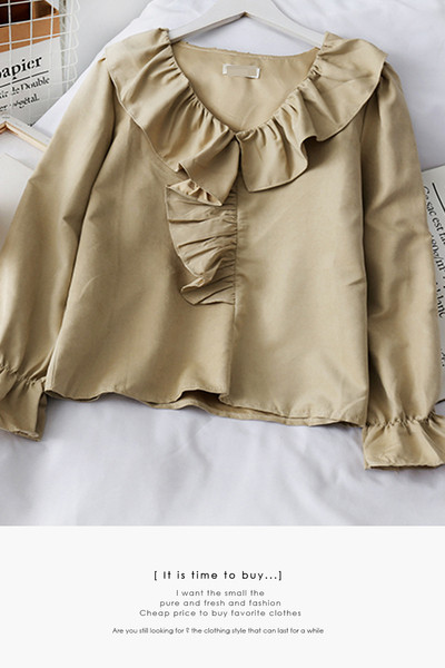 Modern női ing spitz nyakkivágással és fürtökkel