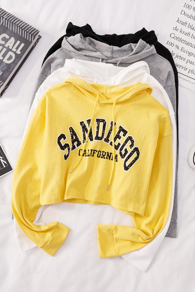 Alkalmi női blúz kapucnival és nyakkendővel