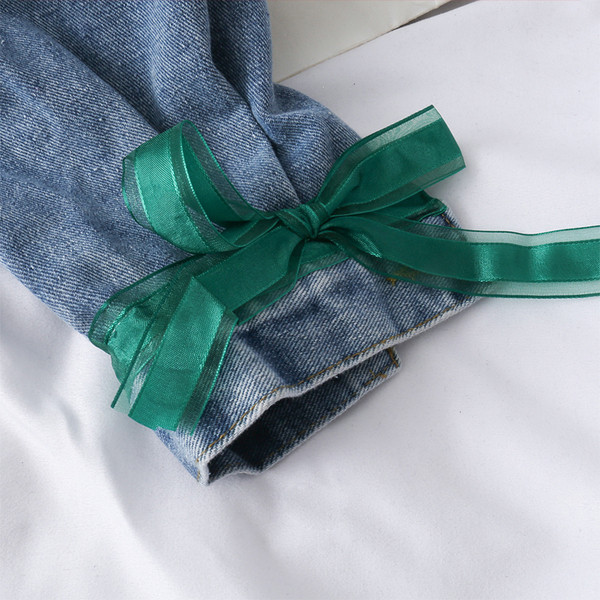 Moodne naiste teksakrae tikandite ja paeltega