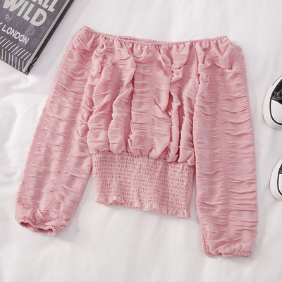 Modern női blúz hosszú ujjal és csónakos nyakkivágással