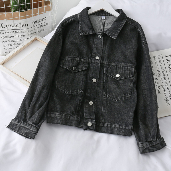 Moodne naiste teksajakk tikandite ja lipsudega sinise ja musta värviga