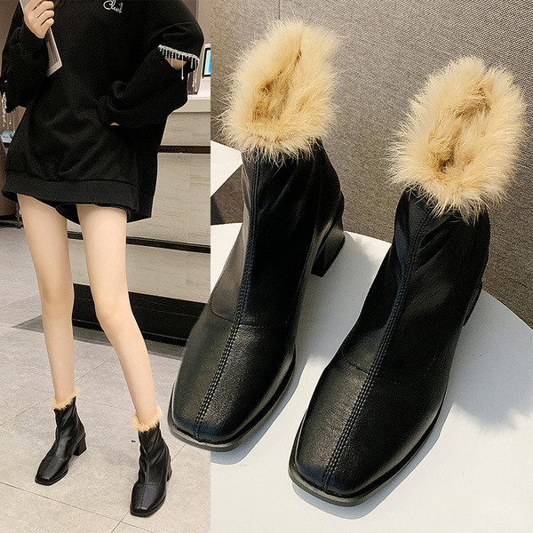Női bőr őszi-téli csizma vastag sarokkal és puha béléssel, fekete színben