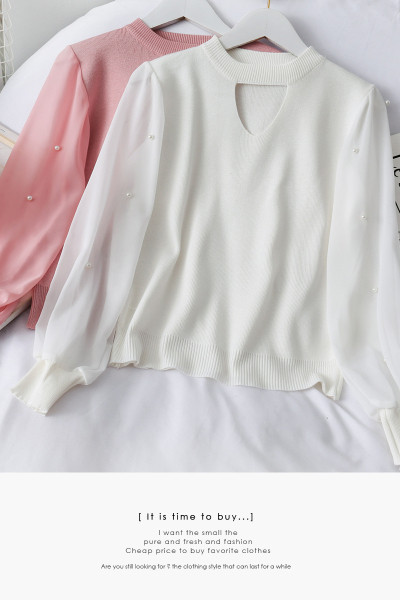 Modern női pulóver ovális nyakkivágással és tüll ujjakkal