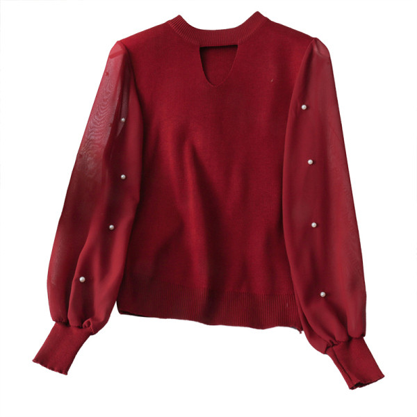 Modern női pulóver ovális nyakkivágással és tüll ujjakkal