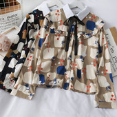 Moodne naiste särk paela ja klassikalise kraega