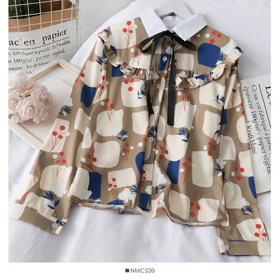 Moodne naiste särk paela ja klassikalise kraega