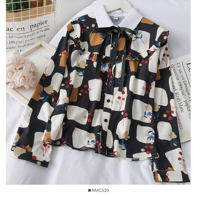 Moodne naiste särk paela ja klassikalise kraega