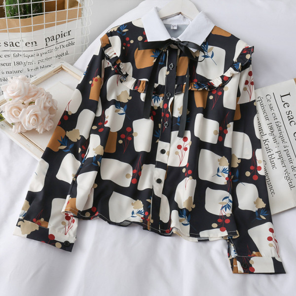 Moodne naiste särk paela ja klassikalise kraega