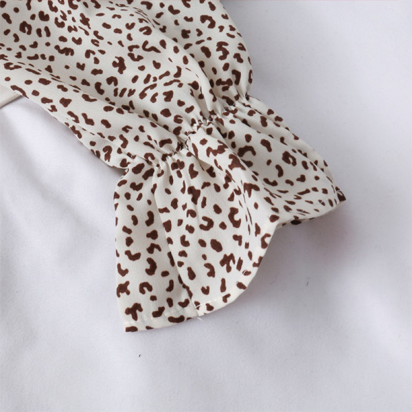 Modern női ing szalaggal és hosszú ujjal