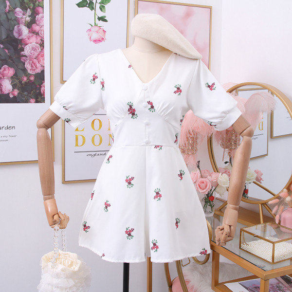 Modern női overál spitz nyakkivágással és rövid ujjal