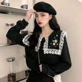 Női topikus blúz fekete színben, hímzéssel