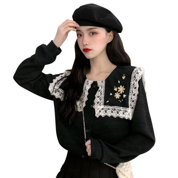 Női topikus blúz fekete színben, hímzéssel