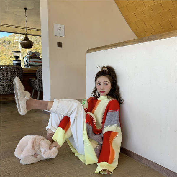 Modern női hosszú pulóver két színben széles modellben