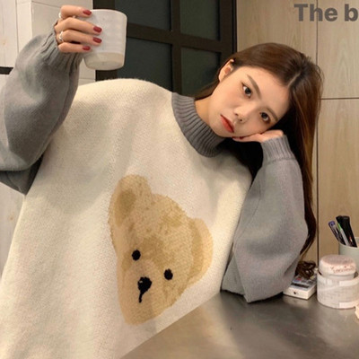 Γυναικείο casual πουλόβερ με ωοειδές ντεκολτέ και animal print