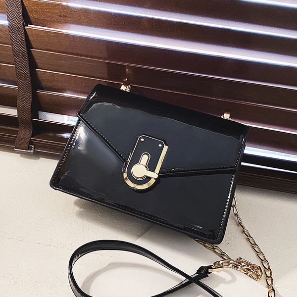 Új modell női táska hosszú fém fogantyúval