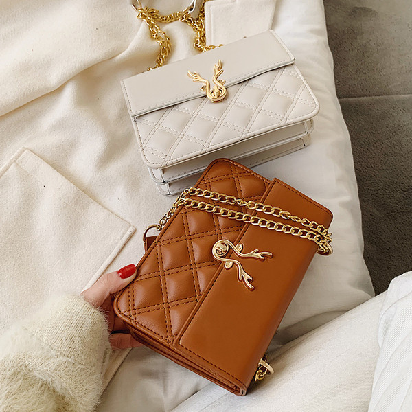 Női bőrtáska hosszú füllel, fehér, barna, fekete és sárga színben