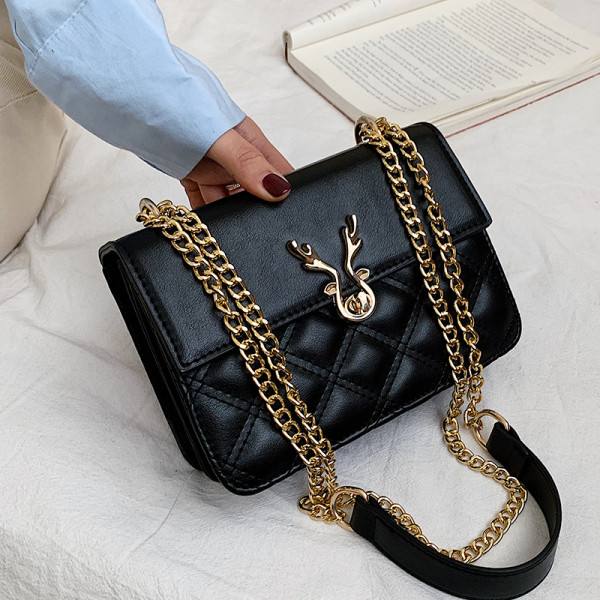 Női bőrtáska hosszú füllel, fehér, barna, fekete és sárga színben