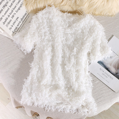 Modern női blúz V-nyakkal és tollal