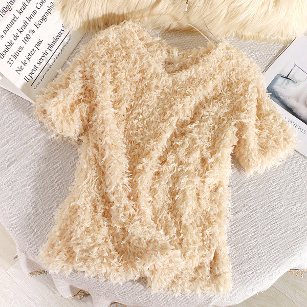 Modern női blúz V-nyakkal és tollal