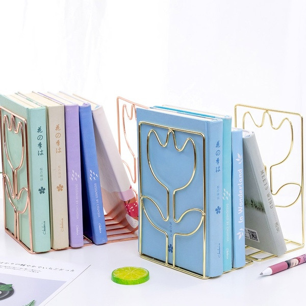 Metal stand for books and magazines in a rectangular shape with a flower design
