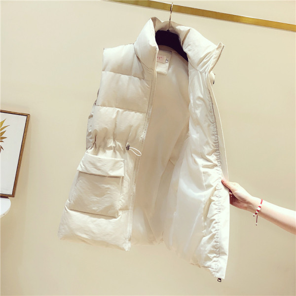 Naiste vabaaja vest taskute ja vöökoha lipsudega