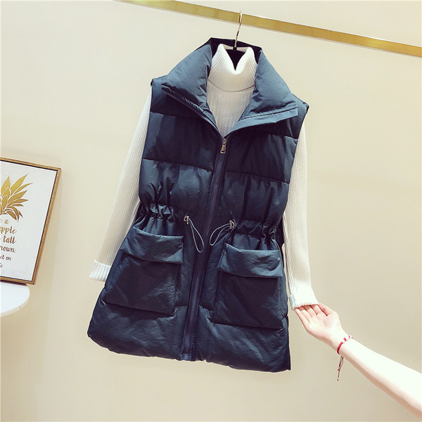 Naiste vabaaja vest taskute ja vöökoha lipsudega