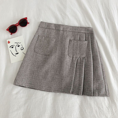 Πλισέ γυναικεία φούστα με τσέπες και γραμμή Α