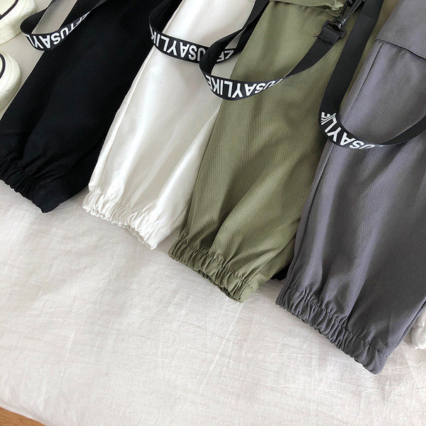 Alkalmi női nadrág magas derékkal és zsebekkel