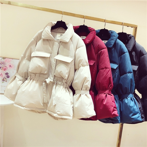 Új modell téli női kabát testhezálló modell derékkötővel