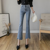 Liibuvad kõrge vöökoha ja rebenenud motiividega naiste teksad - Charlestoni tüüpi