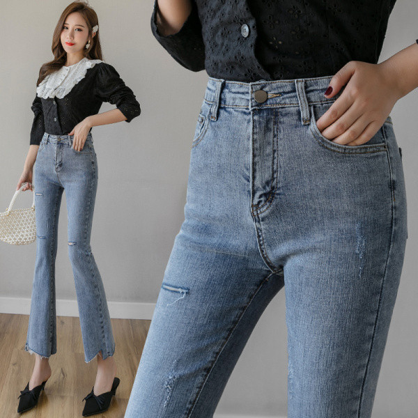 Liibuvad kõrge vöökoha ja rebenenud motiividega naiste teksad - Charlestoni tüüpi