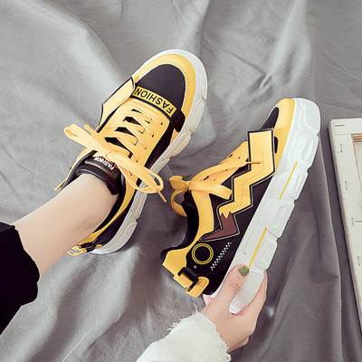 Tavaszi női tornacipő lapos talppal eco bőrből sárga színben