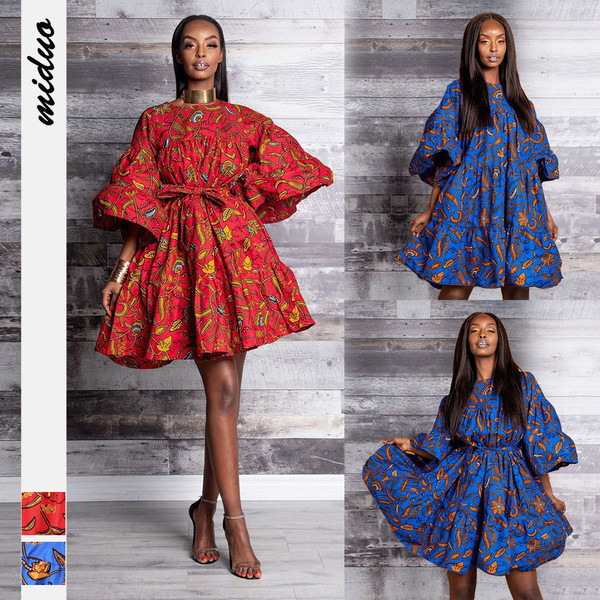 ÚJ Modern női ruha lótusz ujjal, színes mintával - övvel