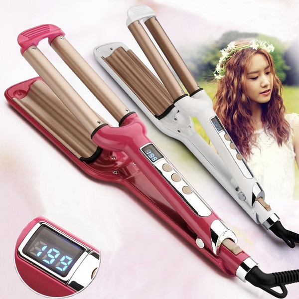 Ceramic retro hair straightener with three tubes and LCD display showing the temperature